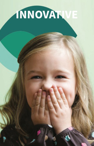 Smiling girl covering her mouth playfully under the word INNOVATIVE.